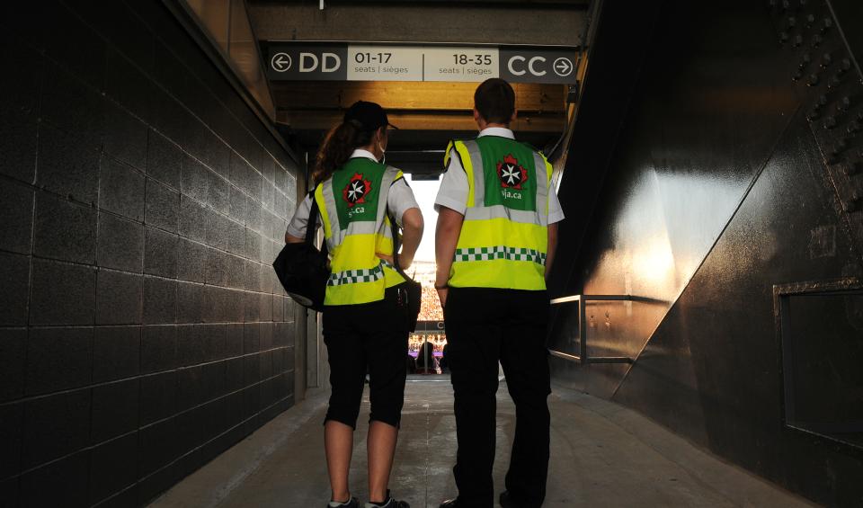 Medical First Responders in a hallway at a stadium