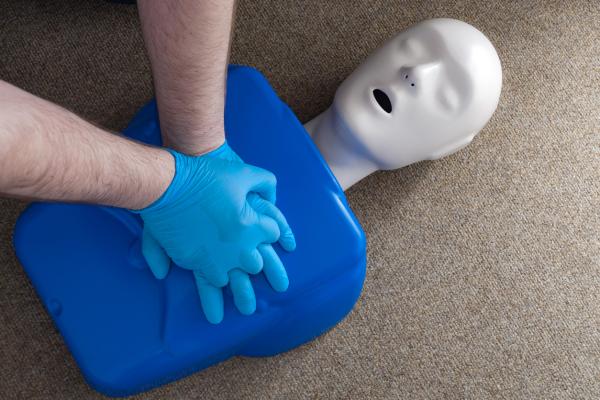 CPR dummy on floor for training