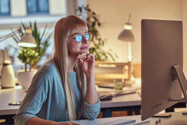 Woman working on computer taking an online course